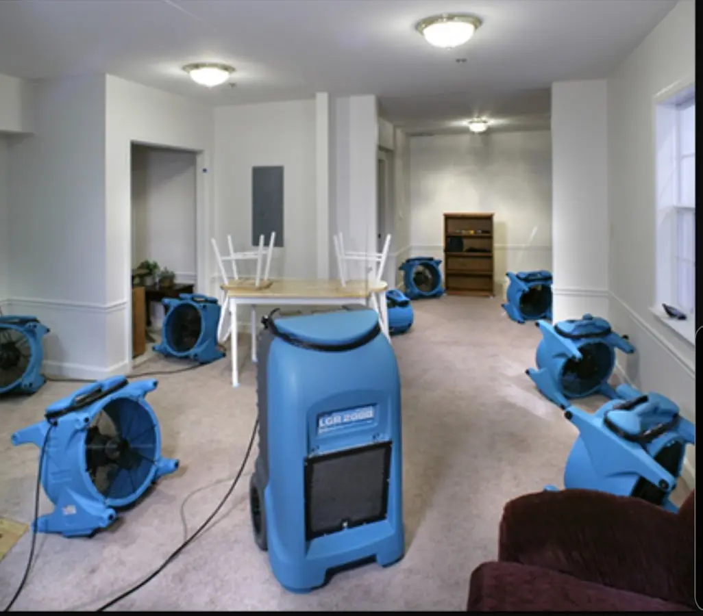 Air movers and dehumidifier setup for Water Damage Restoration in Norwell